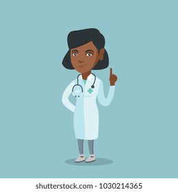 Young african-american doctor pointing finger up. Doctor in medical gown showing finger up. Full length of smiling doctor with finger up. Vector cartoon illustration. Square layout.