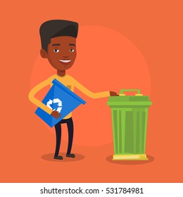 Young african-american man carrying recycling bin. Smiling man holding recycling bin while standing near a trash can. Waste recycling concept. Vector flat design illustration. Square layout.