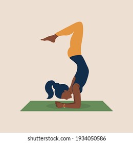 Young African-American woman plays sports on mat home. Beautiful black woman stands upside down, performs handstand. Black female character practicing in yoga studio or home. Flat vector illustration