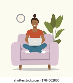 Young afro American woman is relaxing on comfortable chair and using laptop. Vector flat illustration