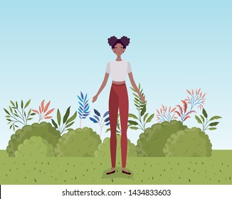 young afro woman standing in the camp