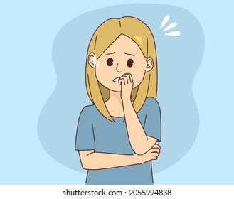 Young anxious worried woman shows stressed and nervous face expression with hands on mouth biting nails