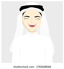 young Arab man laughing on gray background