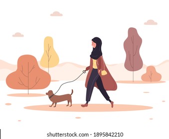 Young arab woman in hijab walks with dog through the woods. Concept happy girl in brown coat with dachshund or poodle. Vector illustration in flat style