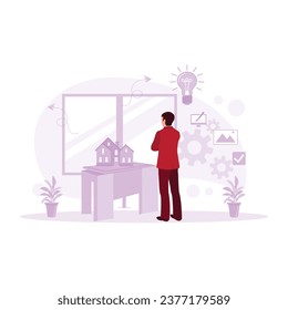 Young architect standing in front of the window looking at a model of a new house to be built. Architect concept. Trend Modern vector flat illustration