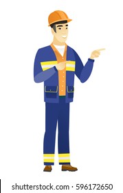 Young asian builder in hard hat pointing to the side. Builder pointing his finger to the side. Builder pointing to the right side. Vector flat design illustration isolated on white background.
