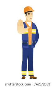 Young asian builder showing palm hand. Full length of builder showing palm hand. Builder making stop gesture by his palm. Vector flat design illustration isolated on white background.