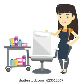 Young asian hair stylist standing near armchair and table with cosmetics in barber shop. Hair stylist standing at workplace in barber shop. Vector flat design illustration isolated on white background