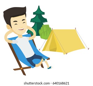 Young asian man relaxing in camping. Smiling man sitting in chair on the background of camping site. Man enjoying his vacation in camping. Vector flat design illustration isolated on white background.