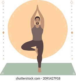 Young asian man standing in tree or Vrikshasana (Balancing Asana) pose with boho style background, man doing yoga in standing posture.