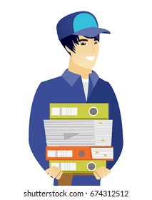 Young asian mechanic holding pile of folders and papers. Young mechanic with folders and files. Vetor flat design illustration isolated on white background.