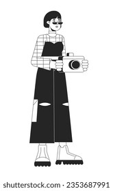 Young asian photographer flat line black white vector character. Editable outline full body girl in trendy outfit holding camera. Simple cartoon isolated spot illustration for web graphic design