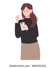 A young Asian woman is holding a smartphone. Smartphone use illustration.