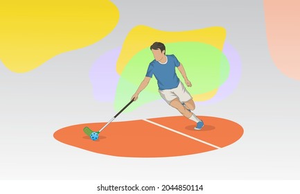 A young athlete with a stick plays floorball. Floorball is a kind of hockey game. Ball hockey in the hall.