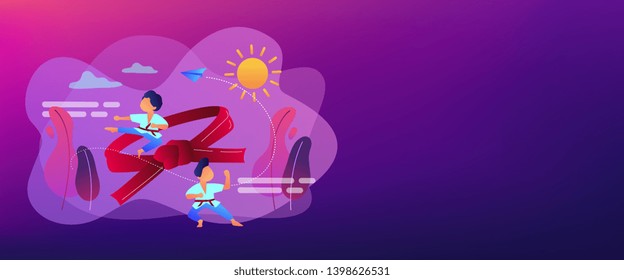 Young athletes doing karate outside at summer camp and big belt, tiny people. Karate camp, kids boxing club, fighting sport section concept. Header or footer banner template with copy space.