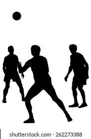 Young athletes playing volleyball on beach