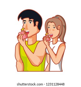 young athletic couple eating apple