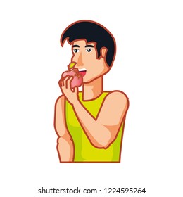 young athletic man eating apple