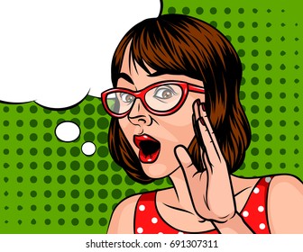 Young attractive girl wants to tell a secret. Portrait of a surprised woman with short dark hair wearing glasses