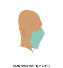 Young bald man with blue medical face mask that protects vi virus. COVID-19.