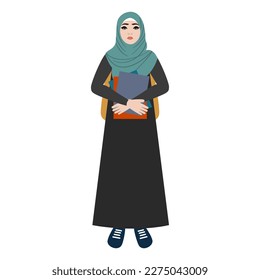 Young beautiful Arab female student wearing hijab holds books in front of her. Education concept