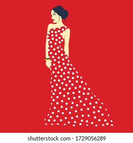 young beautiful girl in a chic polka dot dress in retro style