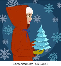 Young beautiful girl in red coat with hood keeps the little Chrictmas tree. Snowflakes , night.