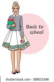 Young, beautiful girl stand . She is holding a book in their hands. Fashion woman in white background. 