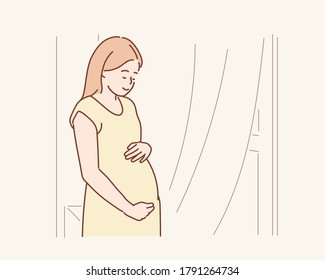 Young beautiful pregnant woman standing near window at home. Hand drawn style vector design illustrations.