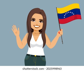 Young beautiful Venezuelan latina woman holding Venezuela Flag and waving hand