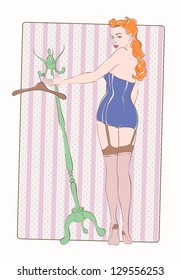 young beautiful woman posing with a hanger, retro styling, pinup