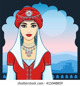The young beautiful woman in a red turban and silver jewelry.  Background - a palace window, a mountain night landscape, dawn.