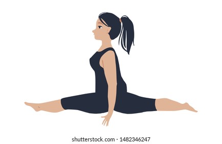 Young beautiful woman in a sportswear doing splits
