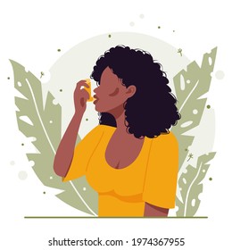 Young black african american woman with black curly hair uses an asthma inhaler against an allergic attack. Concept of world asthma day. Allergy, asthmatic. Bronchial asthma. Vector flat illustration