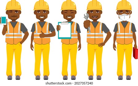 Young black african male builder construction worker standing with yellow safety helmet and orange vest holding different tools