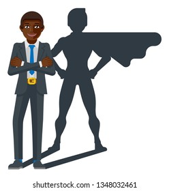 A young black business man revealed as super hero by his superhero silhouette shadow 