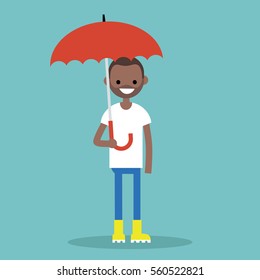 Young black character with umbrella wearing yellow rubber boots / flat editable vector illustration, clip art