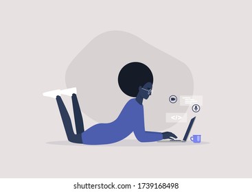 Young Black Female Character Lying On The Floor And Typing On A Laptop, Working From Home Concept