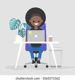 Young black female character working on the laptop in the office. Interior. Daily life. Millennials at work. Flat editable vector illustration, clip art