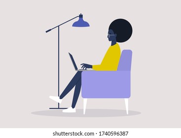 Young black female character working on a laptop from home, social distancing, remote office