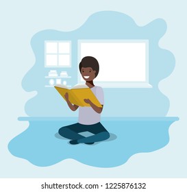young black student sitting reading book