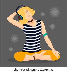 

young blond girl listening to music on headphones