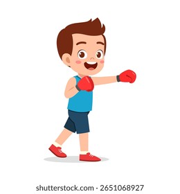 Young Boy in Boxing Stance with Red Gloves, Wearing Blue Shirt and Smiling Confidently