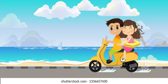 young boy drive a motorcycle on the road near the sea on holiday.
