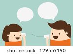 Young boy and girl talking with cup telephone