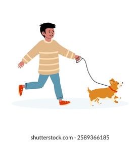 Young boy happily walks his corgi on a sunny day in a park setting