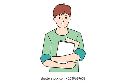 Young boy holding the books