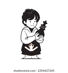 a young boy holding a chess piece while donning a judo gi