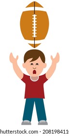 A young boy is intimidated by the large football hurtling down toward him