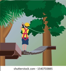 young boy passing the cable route high among trees, extreme sport in adventure park